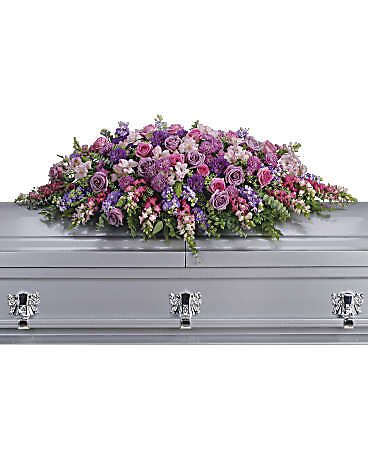 Lavender tribute casket spray